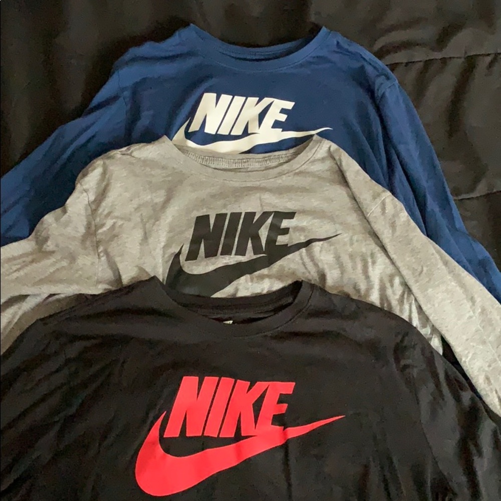 Three Nike Shirts